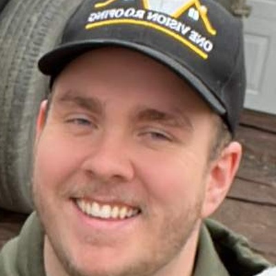 One Vision Roofing crew member